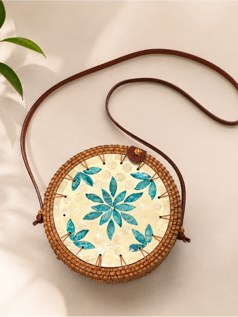 Handwoven Round Crossbody Bag with Turquoise Floral Inlay